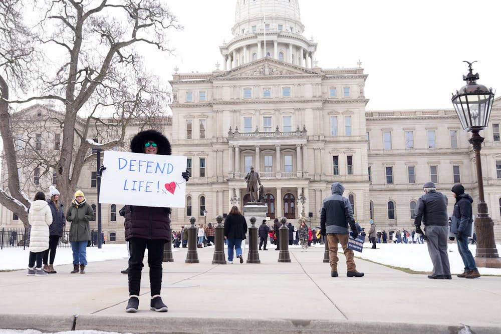 <p>Michigan residents gather in support of the anti-abortion movement at the Right to Life March at the Capitol Building on Jan. 28, 2023.</p>