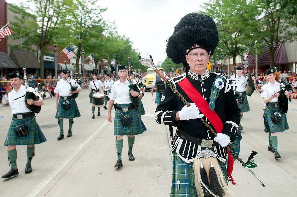 	<p>Glen Erin Pipe Band drum major Doug Campbell leads the band July 4, 2013, at the Independence Day Parade in Easton Rapids. Campbell is seen wearing a tradition drum major uniform used during the Victorian times . Weston Brooks/The State News</p>