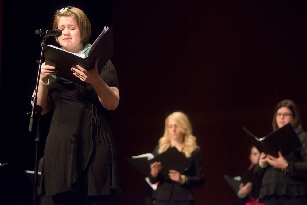 Sophomore vocal performance Suzanna Feldcamp recites a poem during the event Human Trafficking: A Call To Action on March 29, 2016 at Fairchild Theater in East Lansing. The ensemble chose social justice as their theme this year for their music and have been doing volunteer work and other activities related to human trafficking all year. 