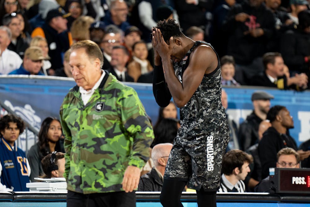 Junior center Mady Sissoko places his hands on his face after fouling out during the Spartans matchup with No. 2 Gonzaga in the 2022 Armed Forces Classic on Nov. 11. The Spartans fell 64-63.