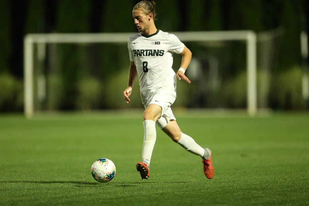 <p>Redshirt sophomore midfielder Alex Shterenberg dribbles the ball past a Washington defender in a Sept. 6 loss at DeMaertin Stadium. PHOTO COURTESY OF MSU ATHLETIC COMMUNICATION</p>