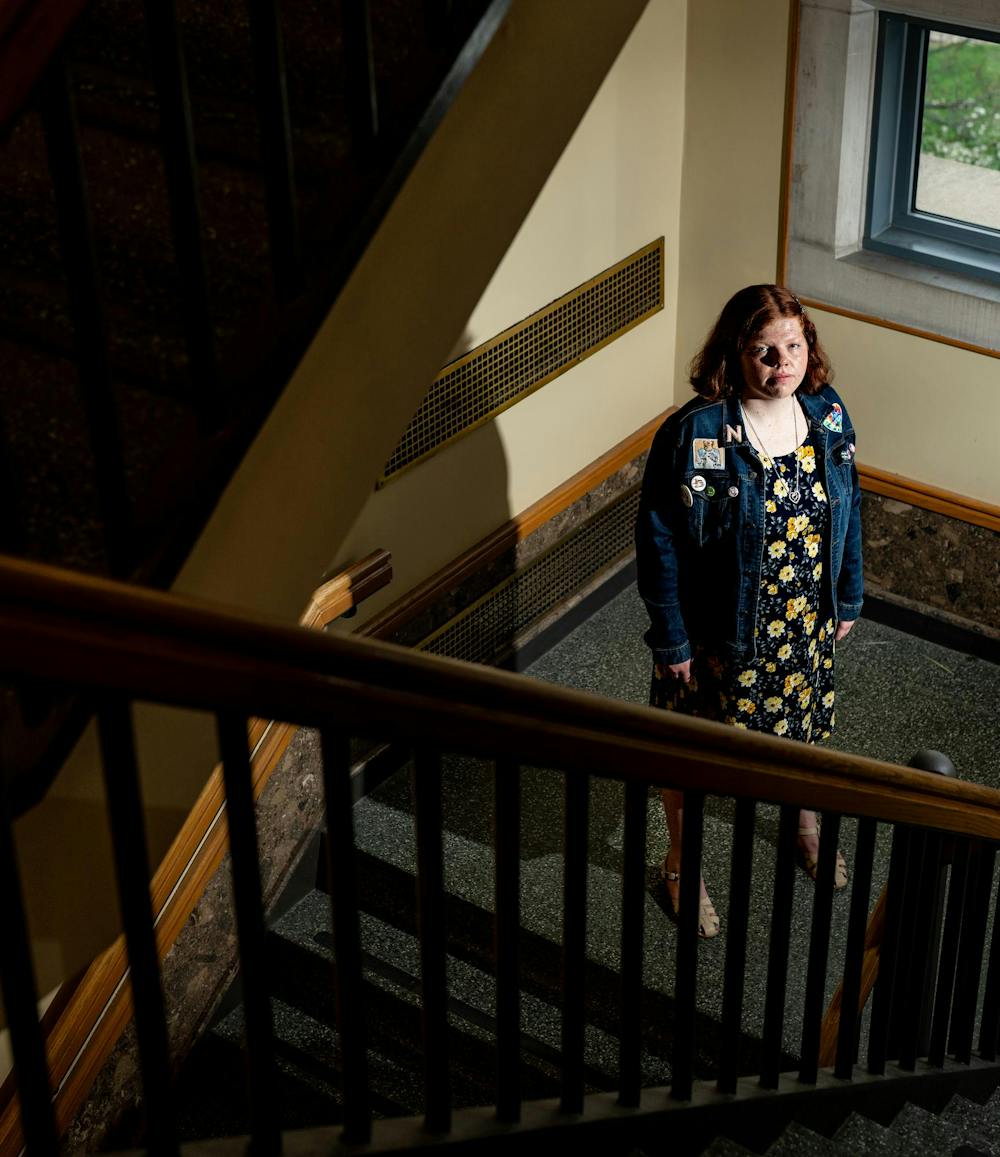 Nina Blum, a Michigan State University political science junior, poses for a portrait at the MSU Union on campus in East Lansing, Mich., on Saturday, April 25, 2026. Blum, who is hard of hearing, often struggles to ensure her accommodations through the Resource Center for Persons with Disabilities are consistently met.