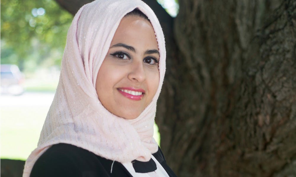<p>Human resource management senior Mariam Alamiri poses for a portrait on Sept. 30, 2015, in the courtyard in front of McDonel Hall. Alamiri has been an Intercultural Aid for the past two years and is a member of the 2015-2016 homecoming court.</p>