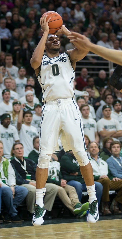 <p>Freshman forward Marvin Clark Jr. shoots a basket Mar. 4, 2015, during the game against Purdue at Breslin Center. The Spartans defeated the Boilermakers, 72-66. Emily Nagle/The State News</p>