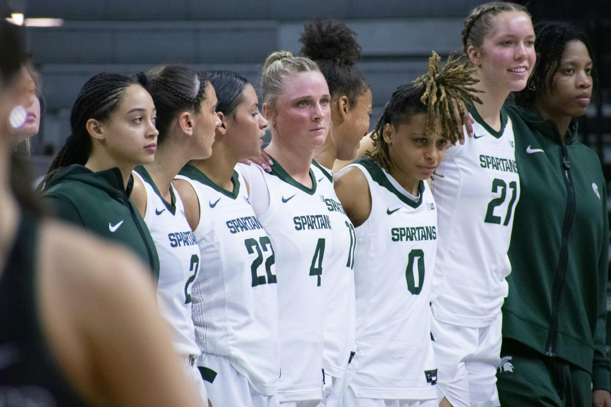 Michigan State University women’s basketball team stands together for the alma mater after losing to Nebraska at the Breslin Center on Dec. 9, 2023. The Spartans lost to the Cornhuskers 74-80. 