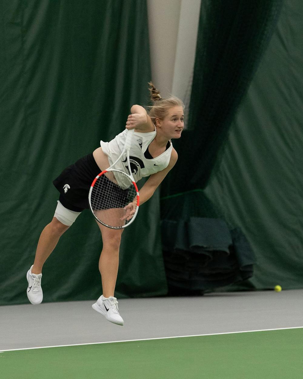 <p>MSU senior Liisa Vehviläinen serves against Xavier at the MSU Indoor Tennis Center on Jan. 24, 2025.</p>