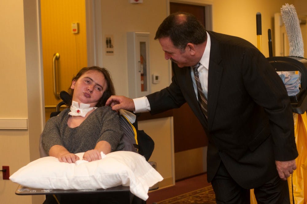 <p>Dale Blakeslee talks to his daughter, MSU alumna Stacy Blakeslee on Nov. 6, 2015 at The Willows, 4830 Central Park Drive, in Okemos. Dale picked up Stacy at The Willows to attend her mother's funeral. Stacy had a very close relationship with her mother, Patty Blakeslee, who passed away from cancer on Oct. 30, 2015. </p>