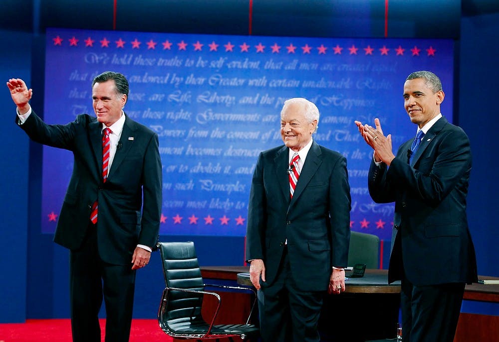 Republican presidential nominee Mitt Romney, left, and President Barack Obama, right, participate in a presidential debate with moderator Bob Schieffer on Monday, October 22, 2012, at Lynn University in Boca Raton, Florida. Richard Graulich/Palm Beach Post/MCT