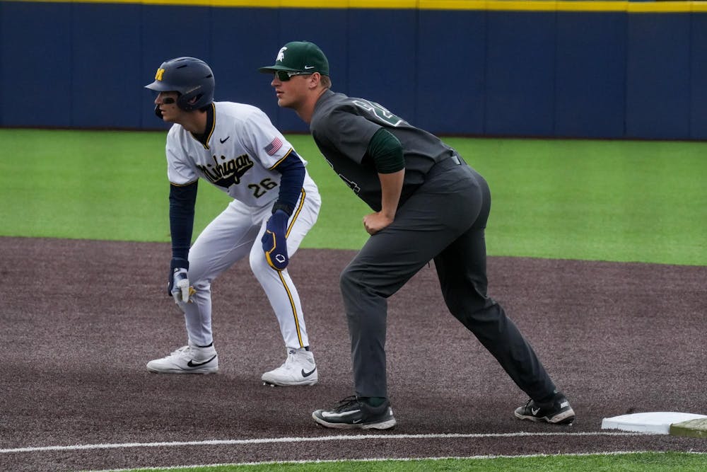 Michigan State redshirt senior first baseman Sam Busch (24) waits for a throw to first base on April 26, 2025. The Spartans lost to the Wolverines in the second game 9-2.