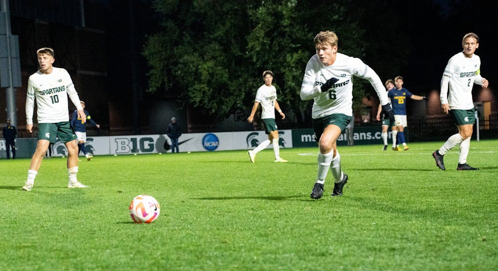 <p>Michigan State freshman forward Jonathan Stout (6) runs after the ball at DeMartin Stadium on Sept. 27, 2022. Spartans defeated the Wolverines 2-0. </p>