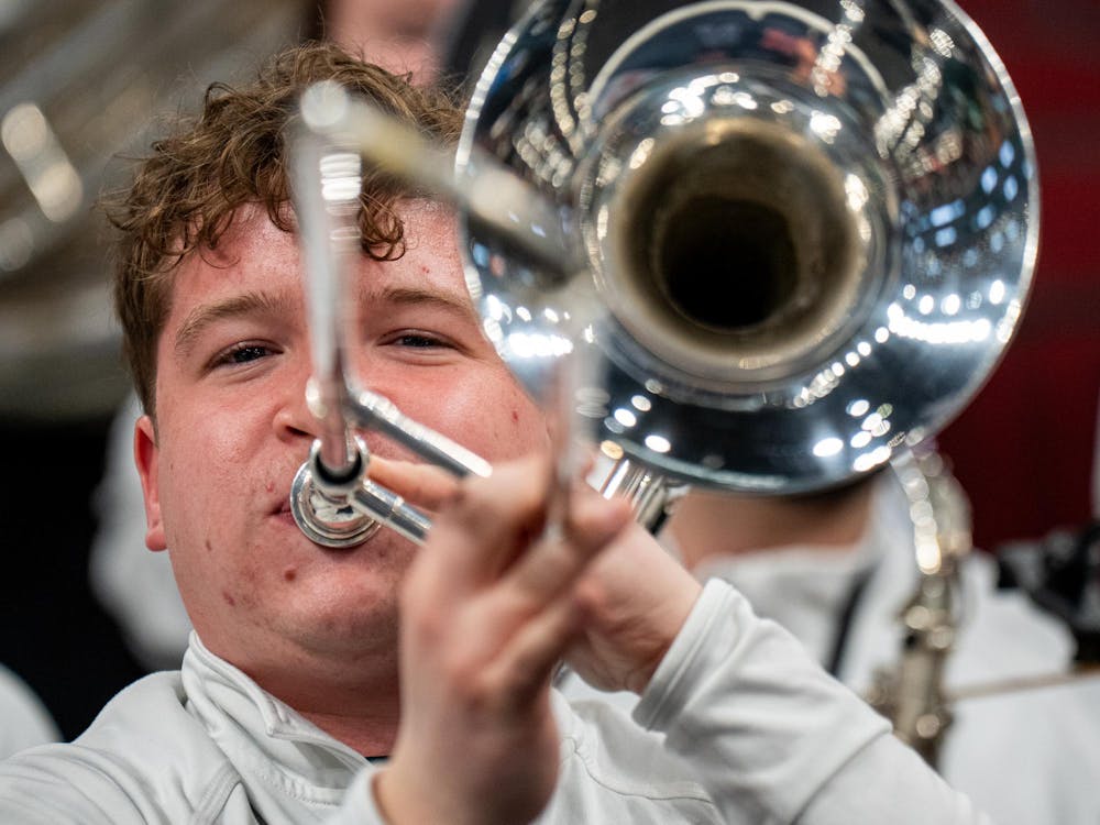 <p>A member of the Spartan Brass plays the trombone ahead of the MSU vs. UCLA basketball game at the Big Ten Tournament inside the United Center in Chicago, Illinois, on Friday, March 13, 2026.</p>