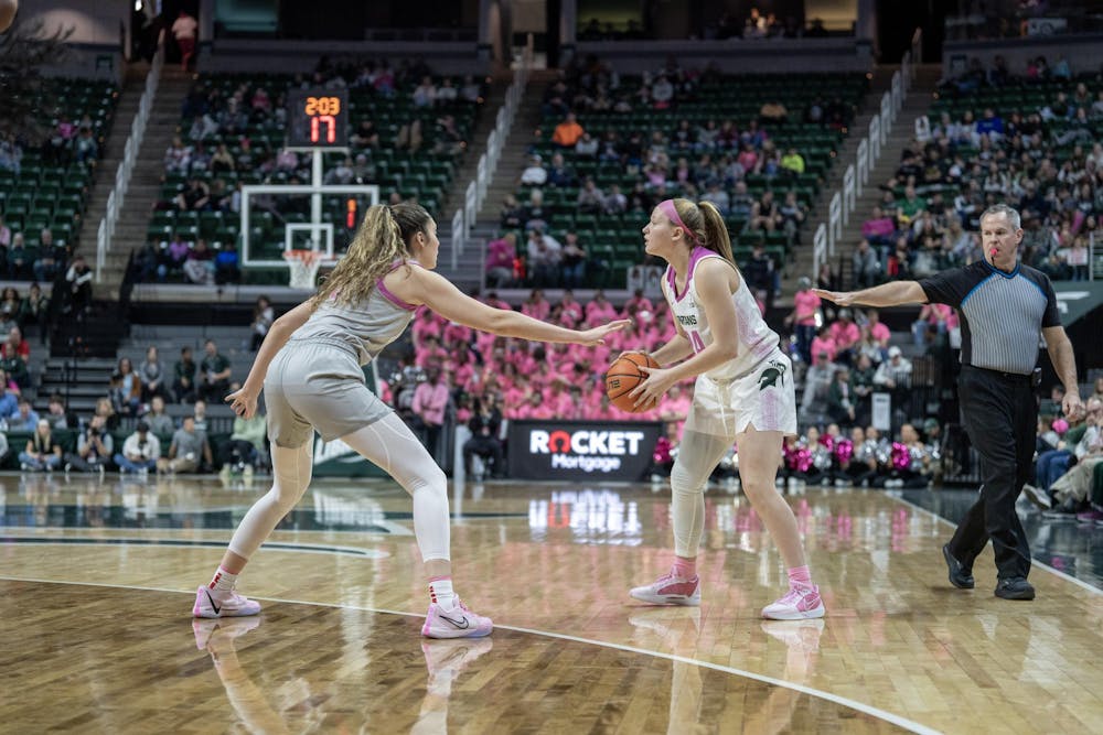 <p>Spartan redshirt junior guard/forward Lauren Ross (24) searches for a fellow Spartan to pass the ball to as opponent redshirt sophomore guard Emma Shumate (5) attempts to block her at the Breslin Center on Feb. 11, 2024. The Spartans lost to the Buckeyes 71-86.</p>