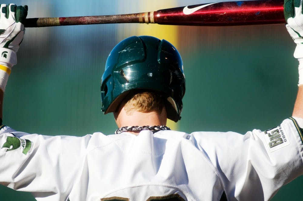 	<p>Sophomore infielder Ryan Jones stretches before his turn to bat Tuesday at Cooley Law School Stadium in Lansing. The Spartans are off to 22-10 start using small-ball techniques with the new, thicker bats.</p>
