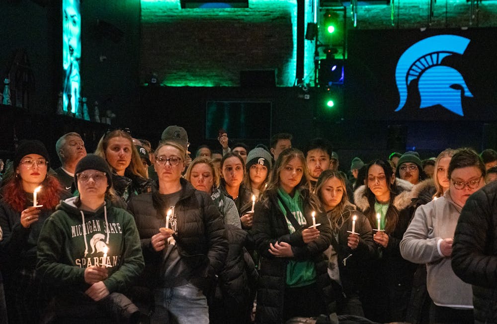 Hundreds of Chicago residents gathered in support of the MSU community for a candlelit vigil organized by Chicago Spartans on Feb. 18, 2023. MSU alumni and supporters came to the Tree House in the city to mourn the loss of three fellow Spartans after a mass shooting took place on campus on Feb. 13, 2023. 