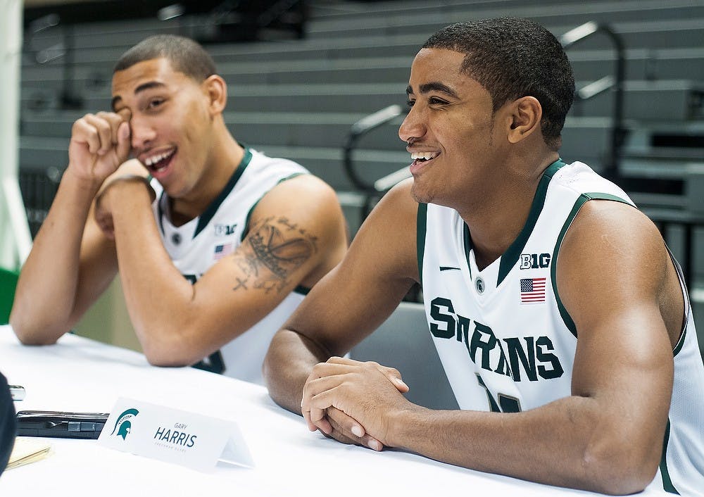 	<p>Freshmen guards Denzel Valentine, left, laughs with teammate Gary Harris on Tuesday, Oct. 9, 2012, at the Breslin Center during media day. Valentine and Harris are two of the four talented freshmen joining the team this year. Julia Nagy/The State News</p>