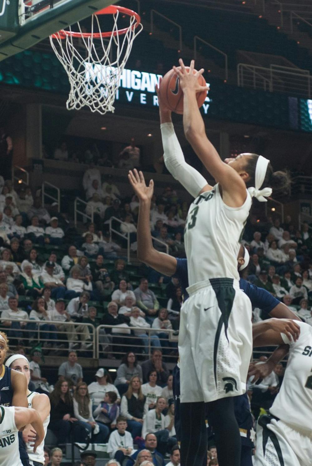 <p>Redshirted sophomore forward Aerial Powers goes up for a rebound during the game against Notre Dame on Nov. 19, 2014, at Breslin Center. The Fighting Irish defeated the Spartans, 71-63. Aerika Williams/The State News.</p>