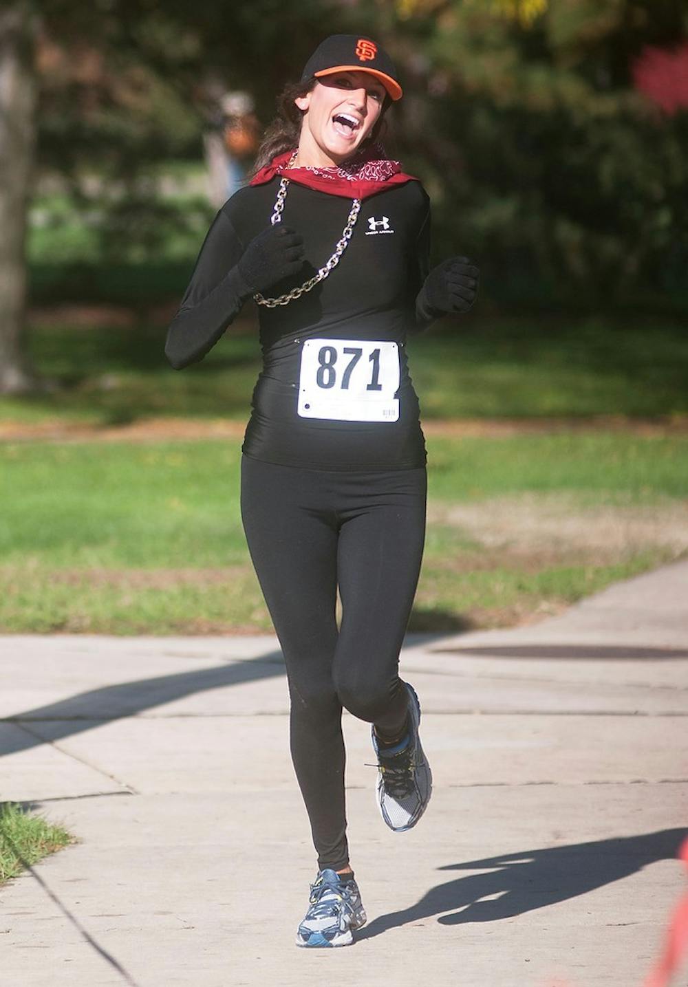 	<p>Graduate student Christina Giacomazzi runs toward the finish line on Nov. 3, 2013, by Fee Hall. The <span class="caps">MSU</span> Student Osteopaathic Medical Association organized a 5k to fundraise for St. Baldrick and Cassie Hines foundations. Georgina De Moya/ The State News</p>