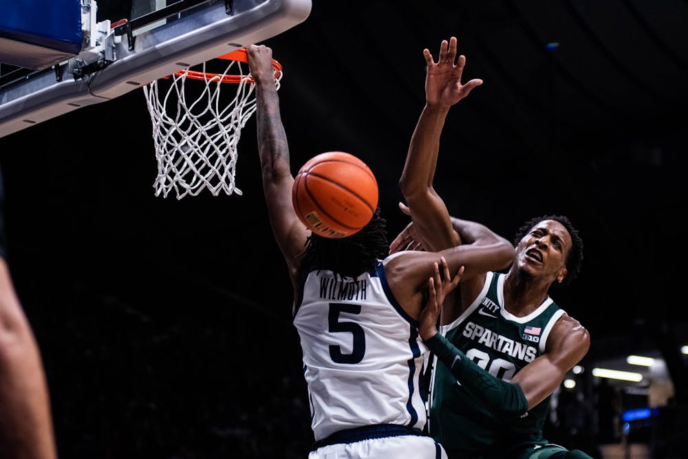 <p>Senior forward Marcus Bingham Jr. (30) blocks the ball during the game against Butler on Nov. 17, 2021, at the Hinkler Fieldhouse. The Spartans defeated the Bulldogs 73-52. </p>
