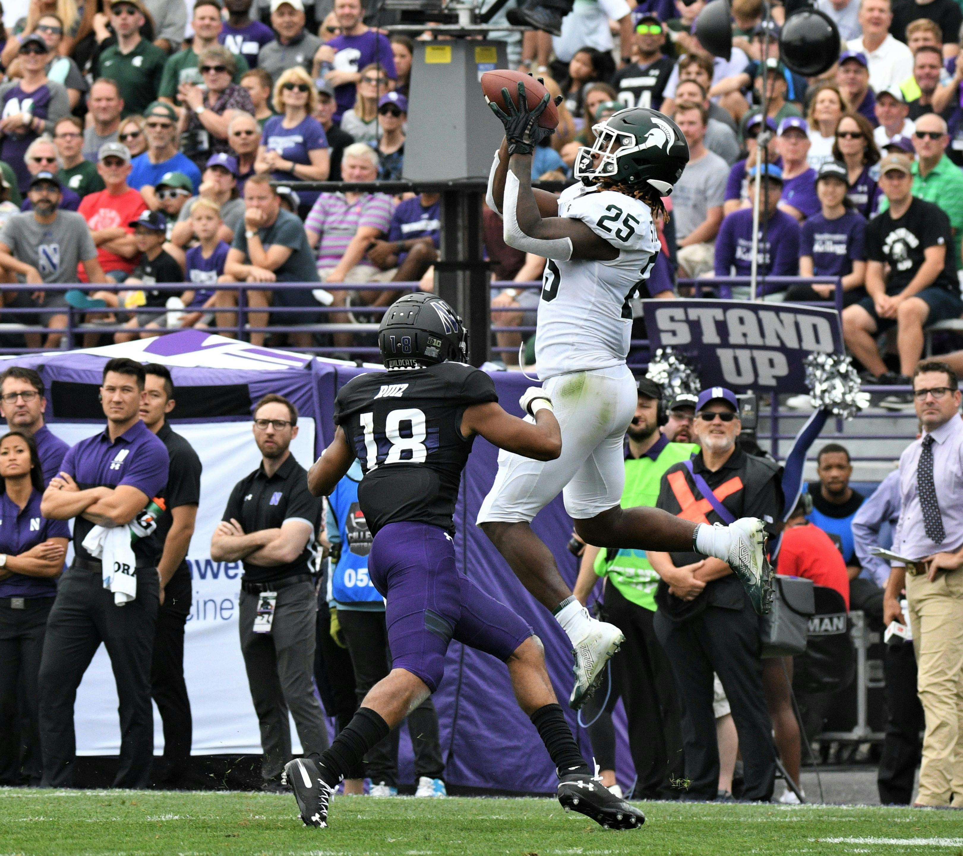 <p>Darrell Stewart Jr. (25) makes a catch during the game against Northwestern on Sept. 21, 2019 at Ryan Field. MSU defeated Northwestern, 31-10.</p>