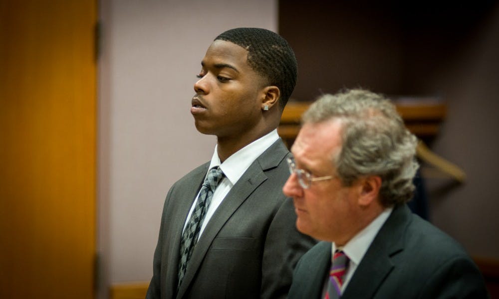 <p>Ex-MSU football player Donnie Corley, left, appears before 54-B District Court Judge Richard Ball during his arraignment on June 7, 2017 at 54-B District Court in East Lansing.&nbsp;</p>