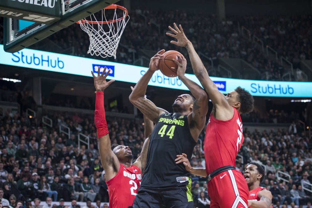 <p>Junior forward Nick Ward (44) shoots the ball during the men's basketball game against Ohio State at Breslin Center on Feb. 17, 2019.&nbsp;</p>