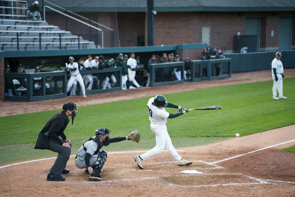 Michigan State redshirt freshman catcher Bryan Broecker (19) fouling before reaching on a fielder's choice in the bottom of the fifth. Michigan State won 7-4 against Purdue Fort Wayne at the McLane Stadium, on Apr. 27, 2022.