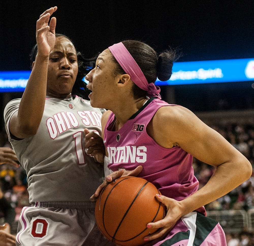 	<p>Redshirt freshman Aerial Powers goes up for the basket past Ohio State guard Ameryst Alston on Feb. 15, 2014, at Breslin Center. The Spartans defeated the Buckeyes, 70-49. Erin Hampton/The State News</p>