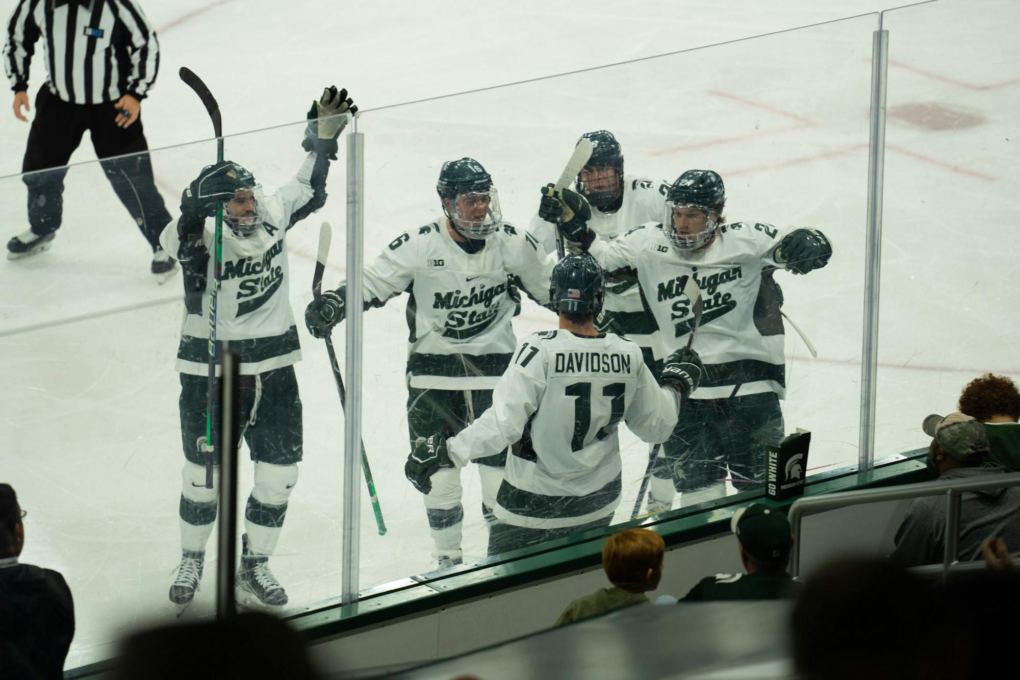 <p>The Spartans celebrate after scoring a point at Munn Ice Arena on Oct. 1, 2022. The Spartans lost to the USNTDP 4-3.</p>