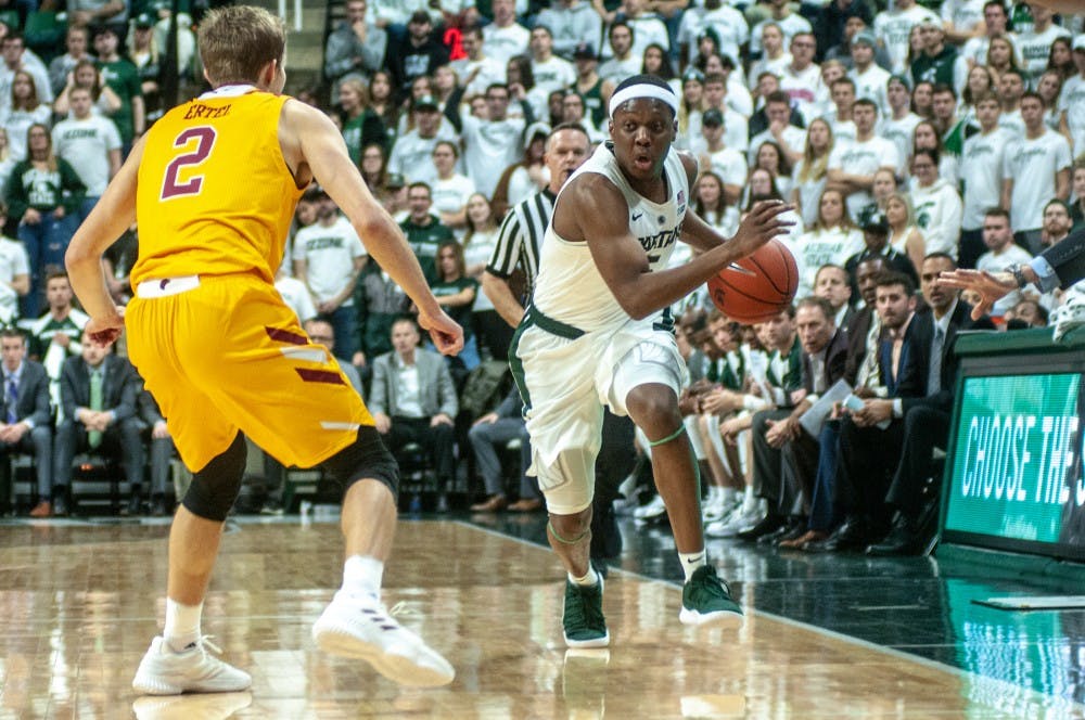 Junior guard Cassius Winston (5) moves down the court during the game against University of Louisiana-Monroe at Breslin Center on Nov. 14, 2018. The Spartans lead the Warhawks at halftime, 35-29.