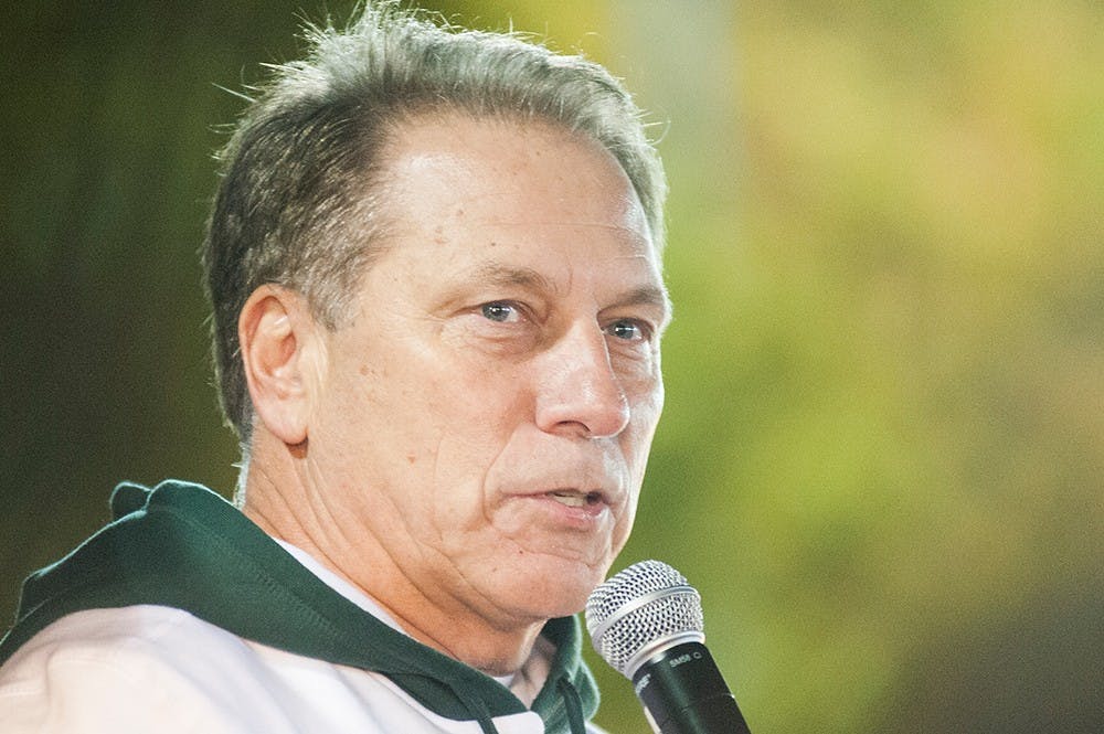 	<p>Head coach Tom Izzo takes a question from the crowd during Izzone Campout on Friday night, Oct. 5, 2012 at Munn field.Justin Wan/The State News</p>