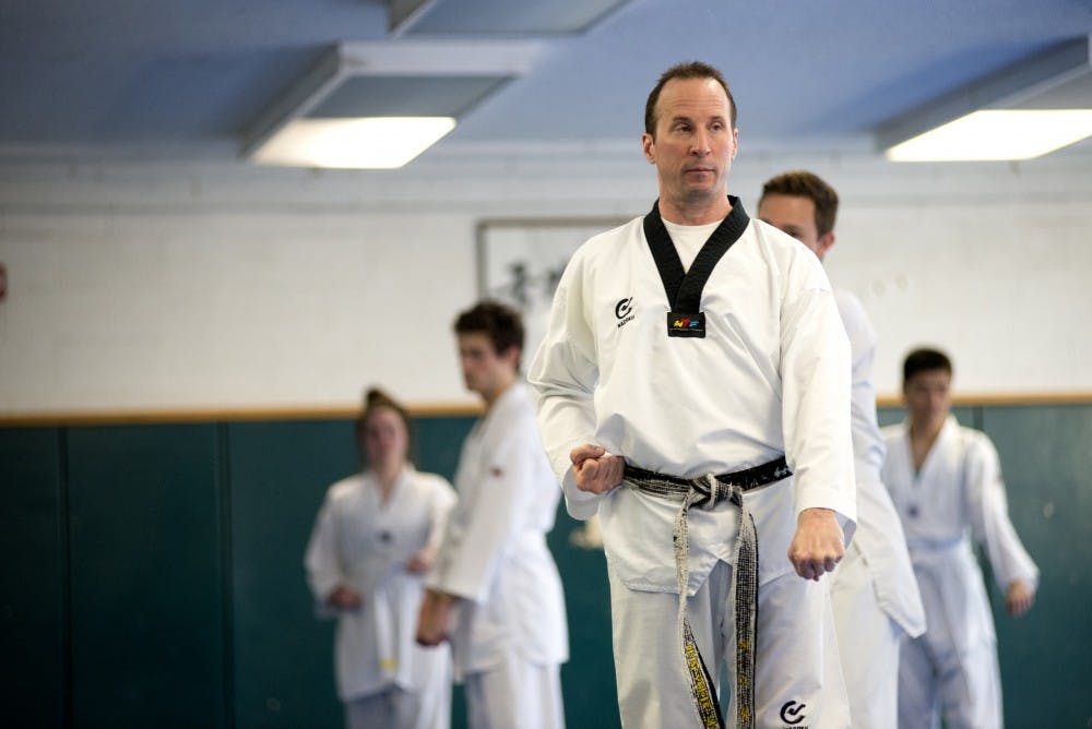 <p>Taekwondo professor Ron Southwick teaches his students on April 18, 2014 at IM West. Southwick began doing Karate in 1978 and when he came to MSU in 1982.</p>
