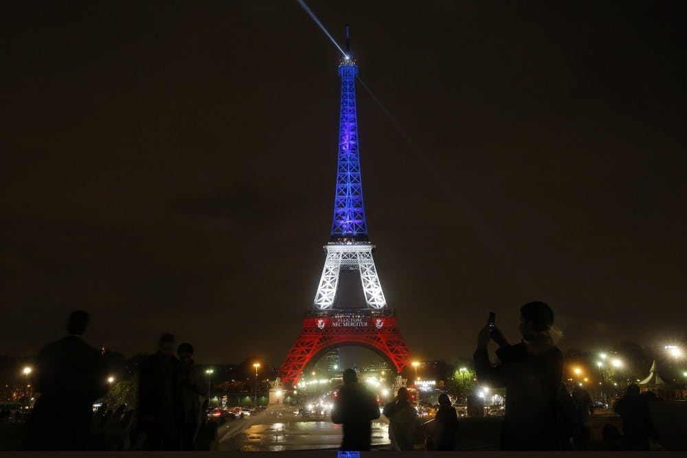 <p>On the third day of national mourning, the Eiffel Tower was lighted in the national colors after going dark on Nov. 16, 2015 in Paris.&nbsp;</p>