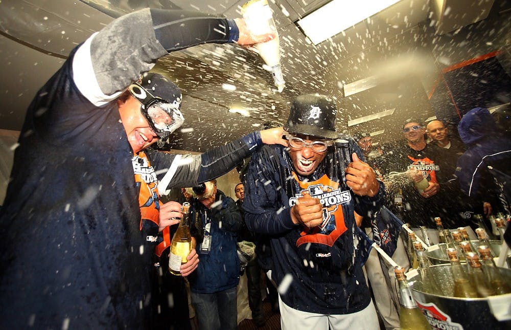 Detroit Tigers&apos; Miguel Cabrera and Austin Jackson celebrate following an 8-1 victory over the New York Yankees in Game 4 of the American League Championship Series at Comerica Park in Detroit, Michigan, Thursday, October 18, 2012. (Julian H. Gonzalez/Detroit Free Press/MCT)
