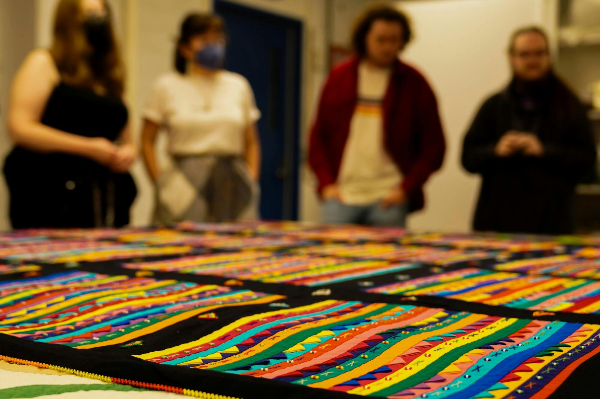 <p>Students interact and discuss quilts at the Central Services Building on Oct. 2, 2023. The quilts are typically housed in the <span style="color: rgb(36, 36, 36);">MSU Museum’s Cultural Collections Resource Center.</span></p>