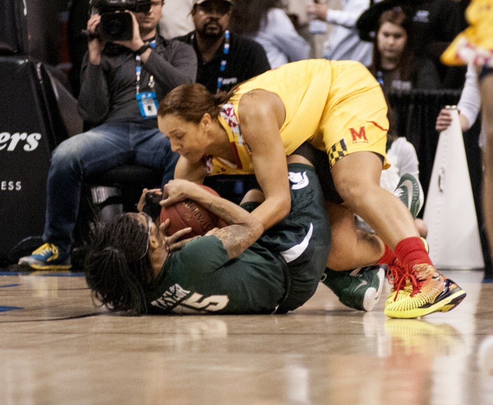 Maryland center Malina Howard tries to take the ball away from graduate student forward Akyah Taylor during the Big Ten Women’s Basketball Tournament championship game against the University of Maryland on March 6, 2016 at Bankers Life Fieldhouse in Indianapolis. The Spartans were defeated by the Terrapins, 60-44. 