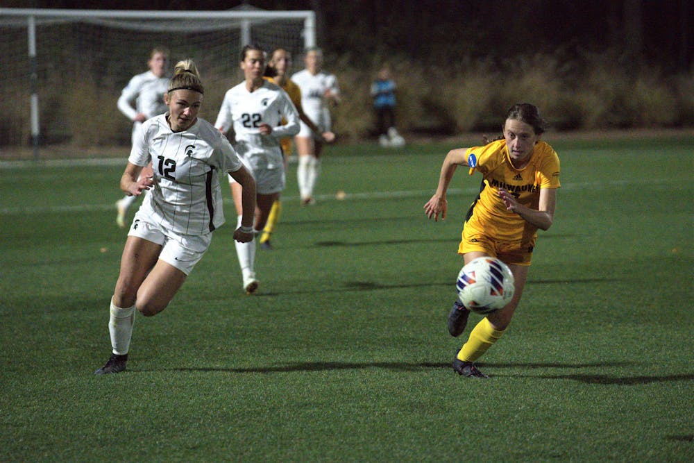<p>Spartan player Jordyn Wickes chases the ball down the field during the playoff match versus the Panthers on Nov. 11, 2022. The Spartans won 3-2 in double overtime. ﻿</p>