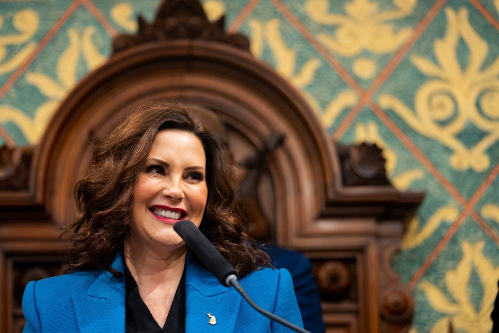 Gov. Gretchen Whitmer greets guests for the State of the State address in The House Chamber at the Capital Building in Lansing on Jan. 25, 2023. 
