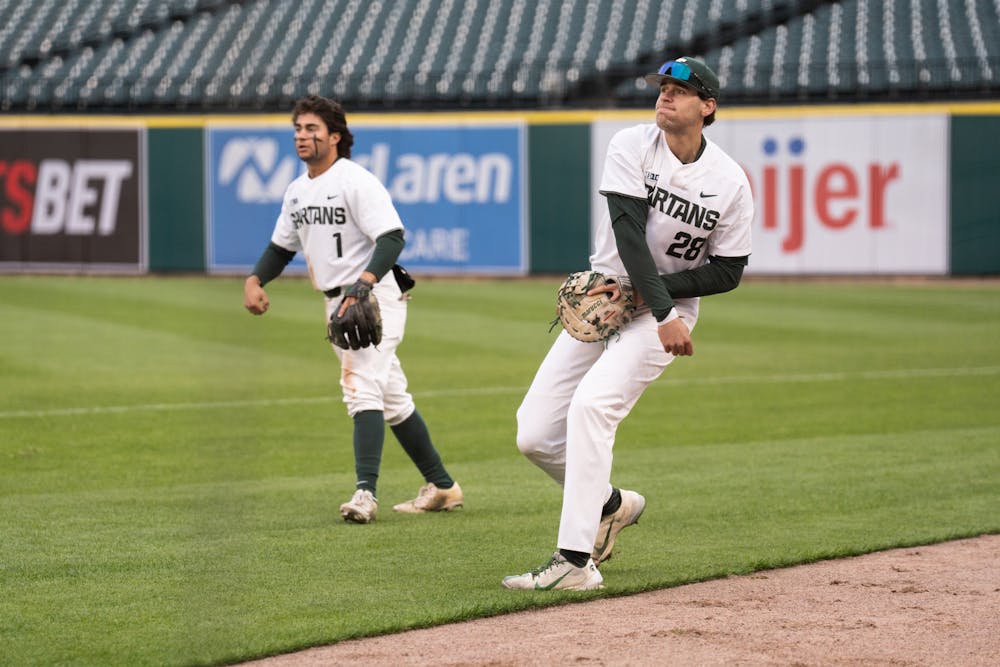<p>MSU sophomore Brock Vradenburg (28) makes a catch in right field and throws it in play during MSU&#x27;s matchup against Notre at Comerica Park in Detroit on April 26, 2022.</p>
