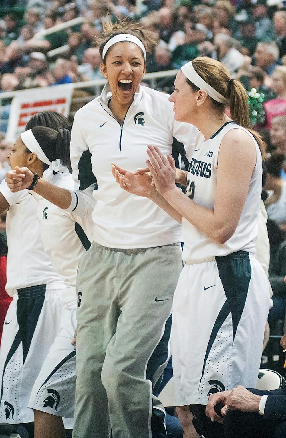 	<p>Then-sophomore center Madison Williams celebrates with then-junior guard Camille Glymph after a point is scored on the sidelines of the basketball game against Purdue on Sunday, Jan. 27, 2013 at Breslin Center. <span class="caps">MSU</span> lost the game in overtime with a final score of 67-62. Danyelle Morrow/The State News</p>