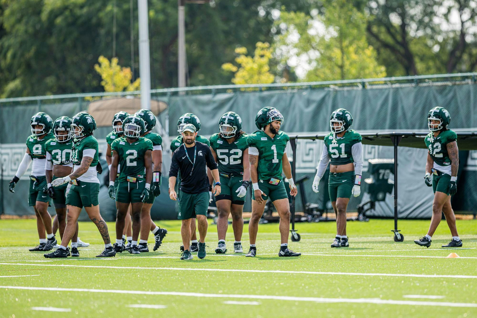 <p>Michigan State defensive players prepare for their next drill during practice at the Duffy Daugherty practice fields in East Lansing, Mich., on Aug. 10, 2026.</p>