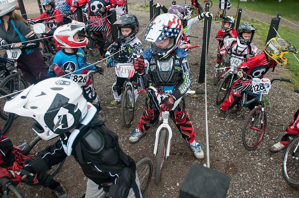 	<p>Boys wait in line for the starting gate June 15, 2013, at Gier Park in Lansing. <span class="caps">BMX</span> races are held at the park Wednesdays and Saturdays. Julia Nagy/The State News</p>