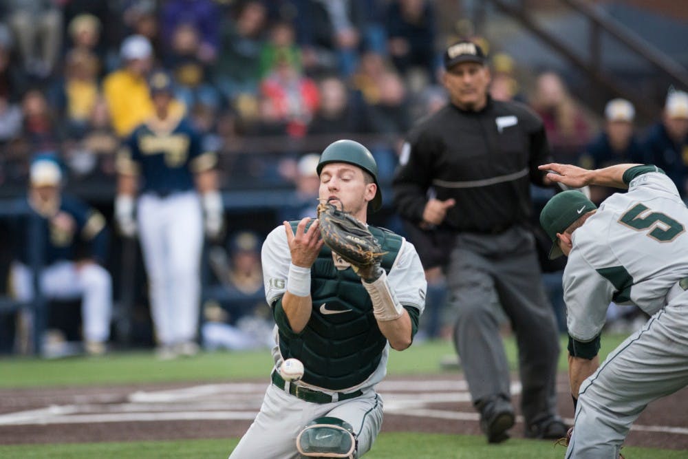 Junior catcher Matt Byars (28) drops a foul ball during the game against Michigan on April 29, 2016 at Ray Fisher Stadium at Wilpon Baseball Complex in Ann Arbor, Mich. The Spartans were defeated by the Wolverines, 4-3.