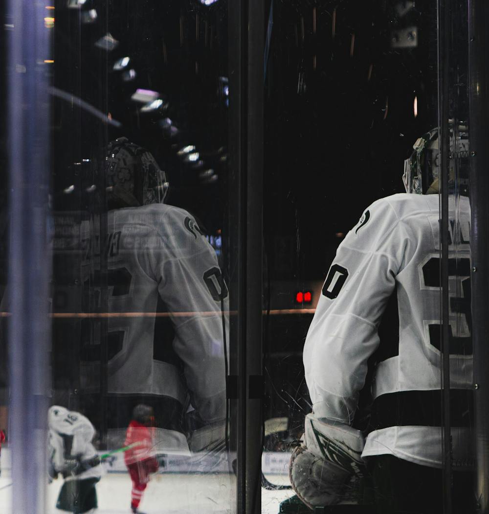 <p>MSU senior goalie Dolan Gilbert (30) watches the game from the bench vs. Ohio State at the Munn Ice Arena in East Lansing, MI, on Feb. 27, 2026.</p>