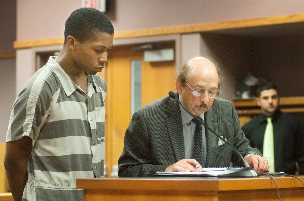 Detroit resident Dishon Tyran Ambrose, 19, appears in East Lansing’s 54B District Court, 101 Linden St., with his attorney Sheldon Halpern on Tuesday, July 17, 2012. Ambrose faces a felony charge of selling or furnishing to a minor causing death relating to the death of MSU freshman Olivia Pryor. Julia Nagy/The State News