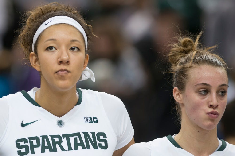 	<p>Junior center Madison Williams, left, and senior forward Annalise Pickrel react to the loss against Penn State on Jan. 19, 2014, at Breslin Center. The Spartans lost, 66-54. Julia Nagy/The State News </p>