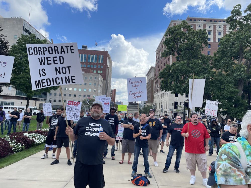 <p>Cannabis caregivers and growers rallied outside the Capitol Sept. 15, 2021 to share their opposition to newly proposed legislation that would change the standing caregiver laws. Photographed by Noah Edgar. </p>