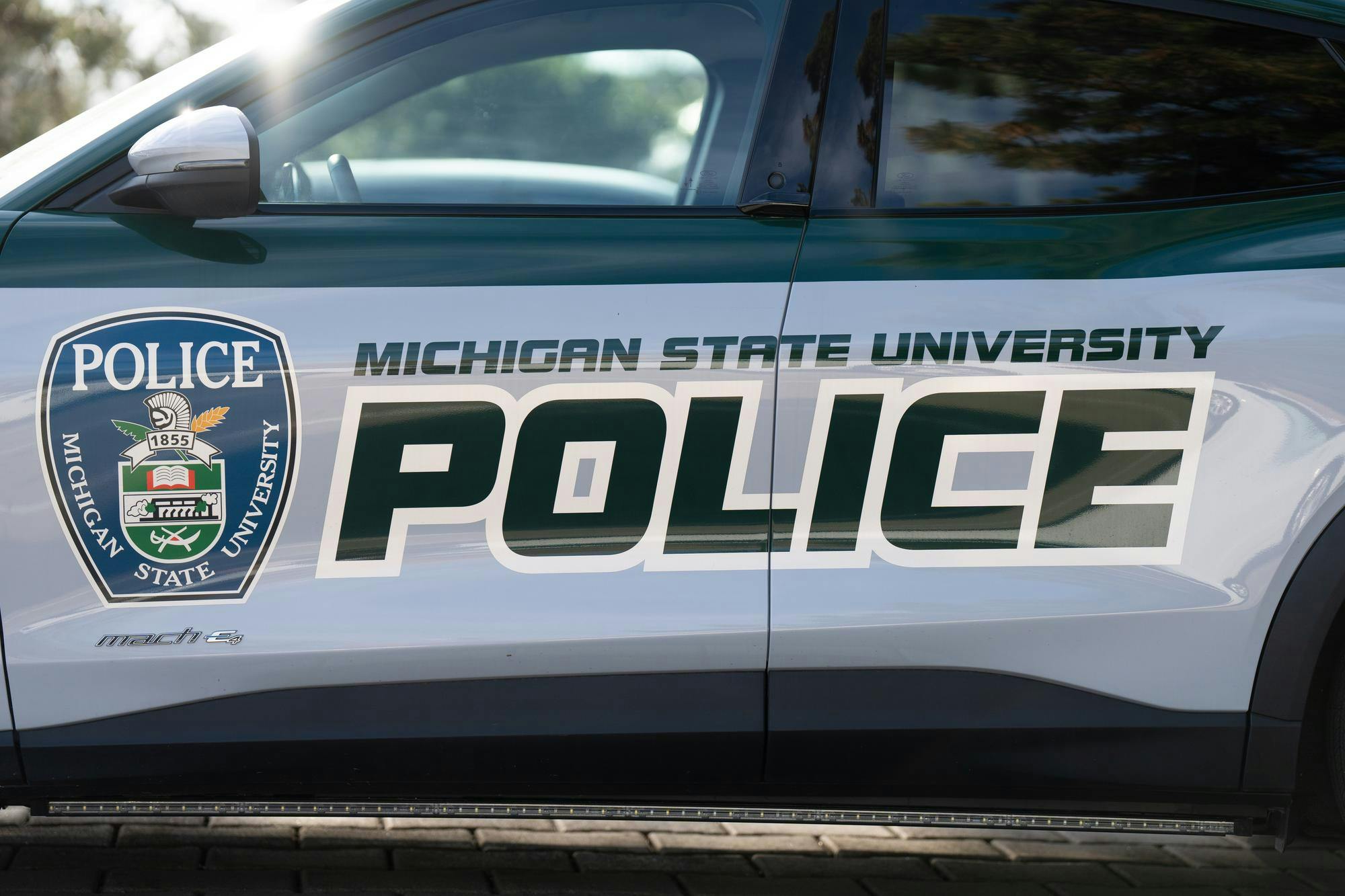A police car parked outside of the Michigan State University Police Department  on Thursday, April 6, 2023.