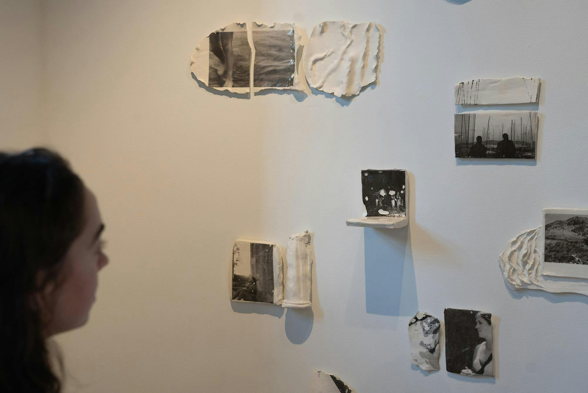 <p>Graphic design senior Avery Horejsi presents her porcelain photography in the "A Present Past, A Passed Present" gallery at the MSU Union on Sep. 15, 2024. "I wanted to capture candid moments of the trip," she said of the exhibit.</p>