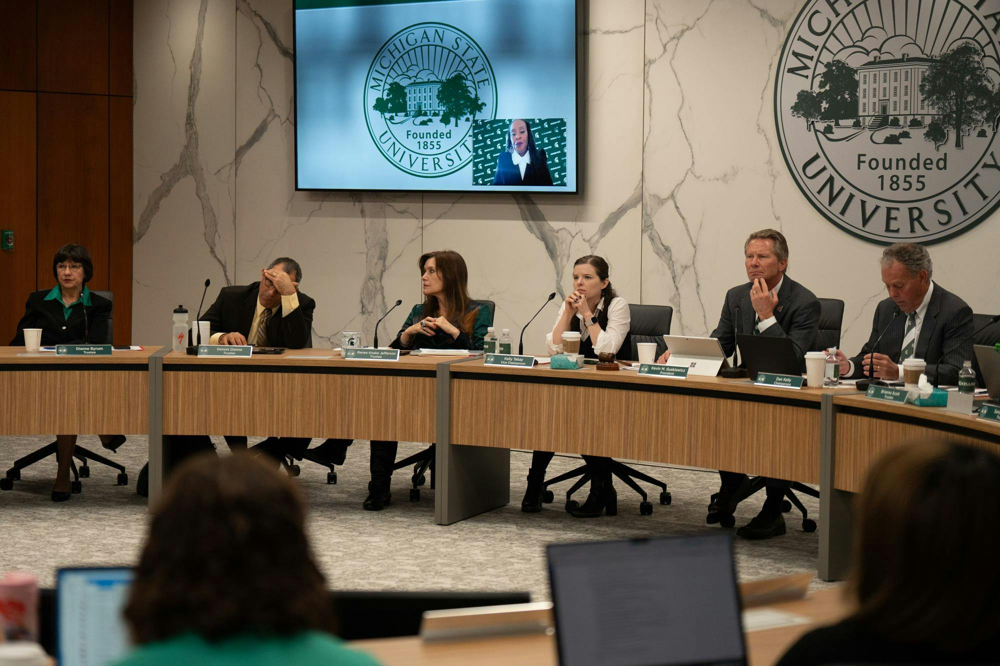 The Michigan State Board of Trustees listen to remarks during a board meeting at the Hannah Administration building on Oct. 25, 2024.