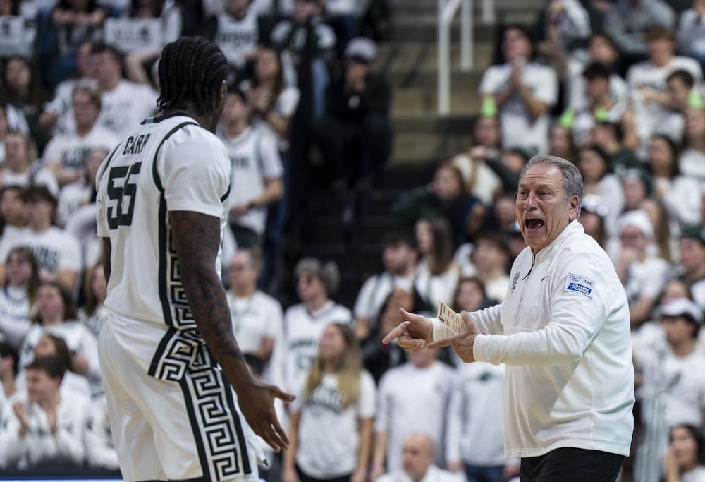 <p>MSU head men’s basketball coach Tom Izzo speaks with MSU junior forward Coen Carr (55) at the Breslin Student Events Center on Jan. 30, 2026. </p>